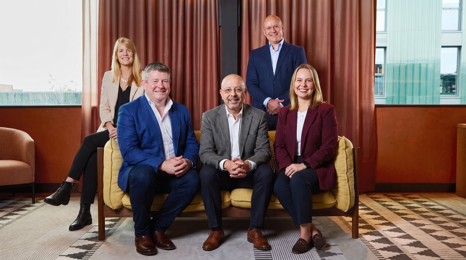 Centre (seated): Egemen Mustafa Şener. Also pictured — Livingston James Group (Scotland) leadership: Jamie Livingston (Group Chair), Mark Lewis (Group CEO), Sophie Randles (Managing Director, Livingston James), Hazel Wynn (Managing Director, Rutherford Cross).